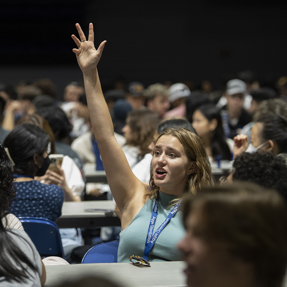 Student raising her hand