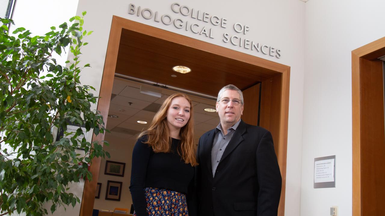 Student Fiona Beyerle stand with Dean Mark Winey