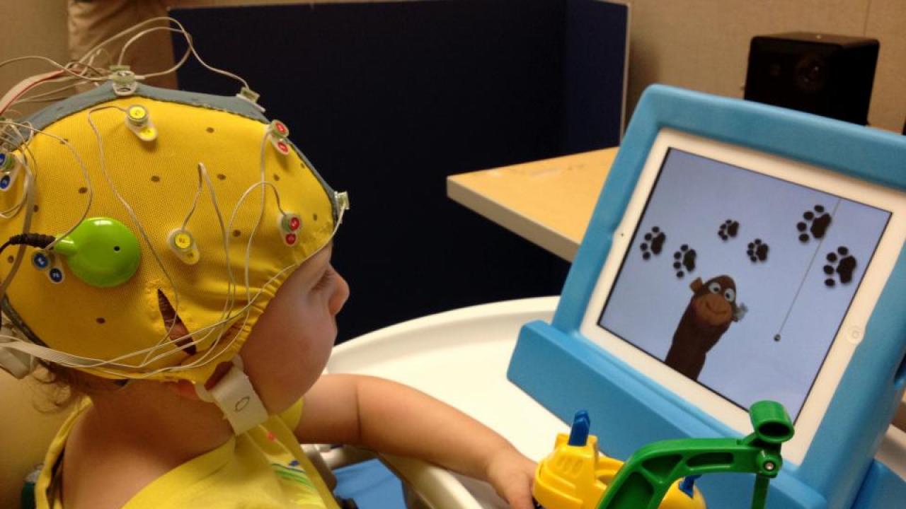 UC Davis researchers are measuring activity in different brain areas as deaf children with cochlear implants process speech. The work could lead to new ways to help kids develop skills in both spoken and signed language. (Photo: S. Corina) Supported by a five-year grant from the National Institutes of Health, Corina and Lee Miller, associate professor of neurobiology, physiology and behavior at UC Davis, are working to understand why some children respond better to the implants than others.