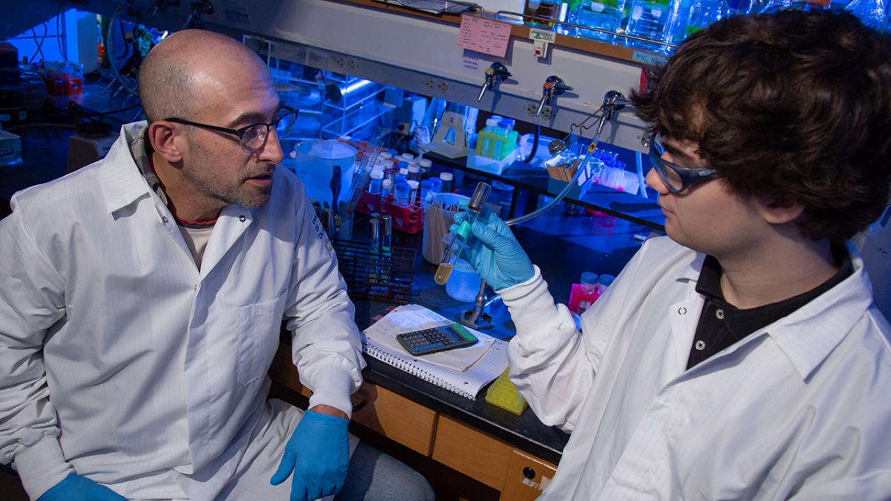 Faculty and student in lab